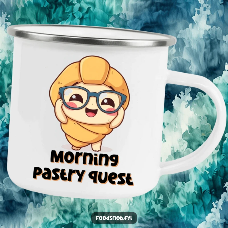 Funny Camping Mug: A rugged mug with a funny graphic of a croissant comically trying to put on tiny spectacles, ideal for outdoor humor.