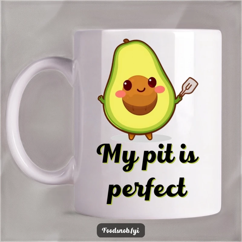 Funny mug showing a smiling avocado character expertly balancing its pit on a miniature spatula, embodying culinary fun.