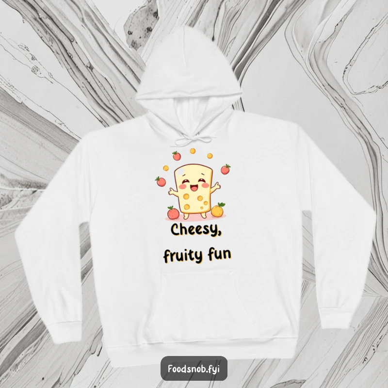 Funny hoodie, a bubbly cheese character giggling while juggling tiny fruits, cozy and full of amusement.