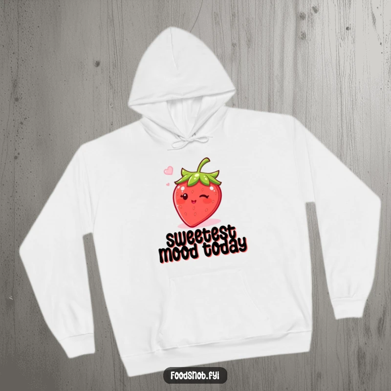 Funny hoodie featuring a bubbly strawberry character winking with sugar, offering warmth and humor for a delightful gift.