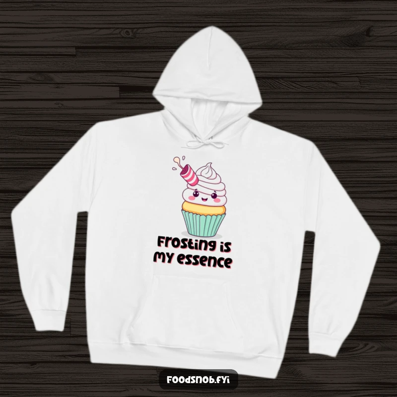 Funny Hoodie: A cheerful cupcake with a party blower exhaling frosting, offering cozy comfort and festive humor, perfect for a funny gift.