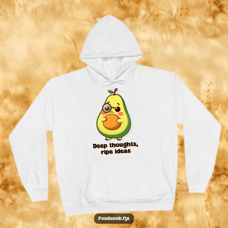 Funny hoodie, a plump avocado wearing a small monocle, looking pensive and distinguished, soft and warm.