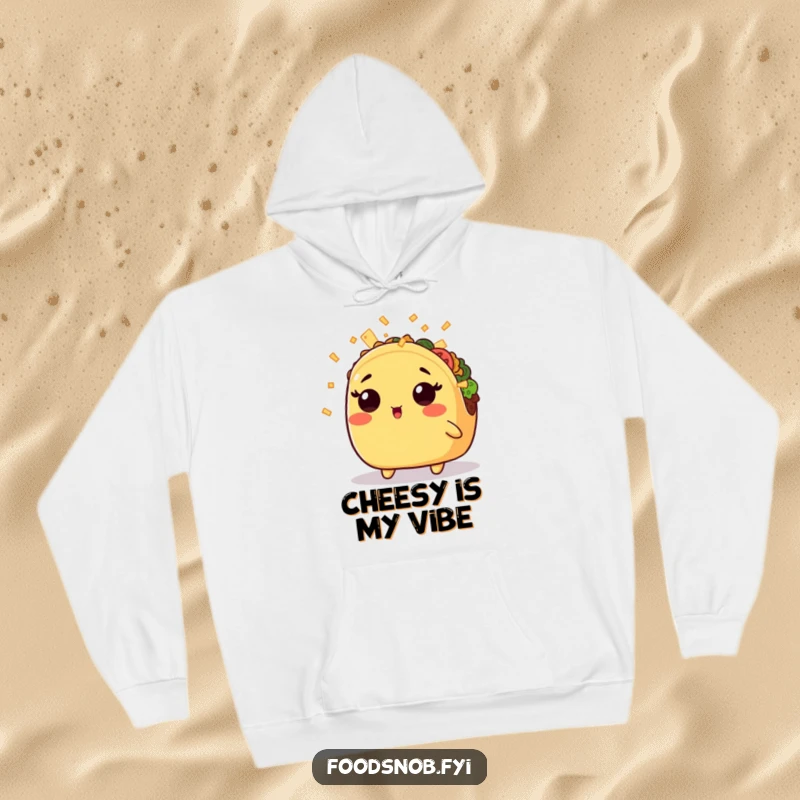 Funny hoodie with a surprised kawaii taco bathed in tiny cheese shreds, offering comfort and comical delight for the wearer.