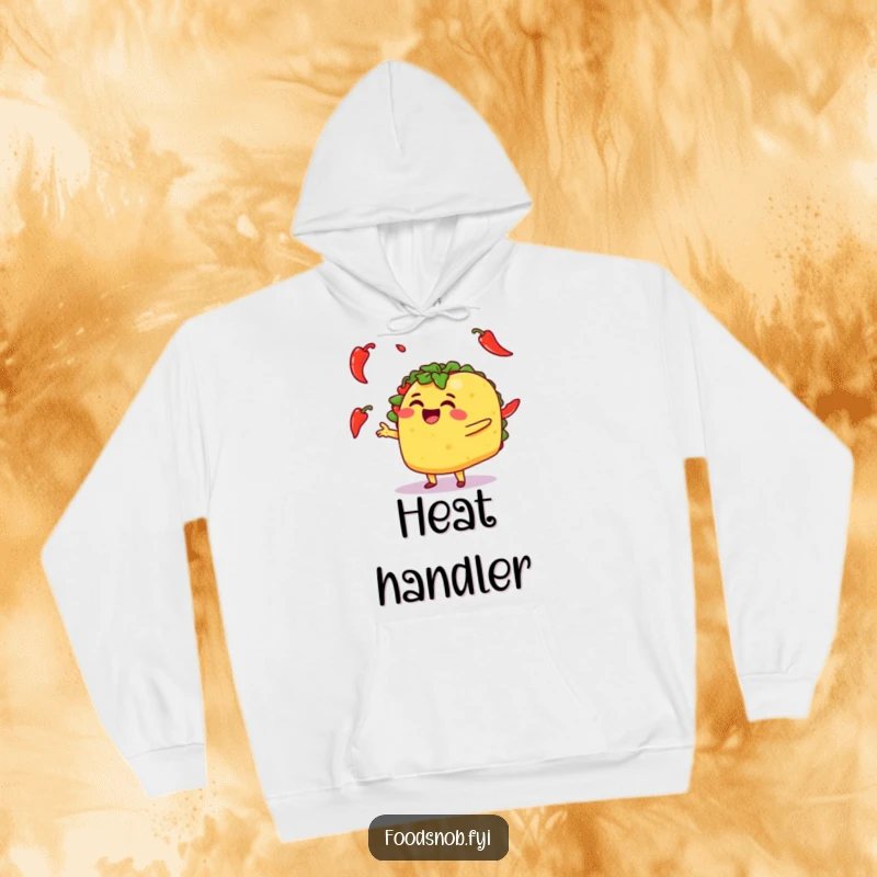 Funny hoodie showcasing a smiling taco character skillfully juggling spicy chili peppers, perfect for casual wear.