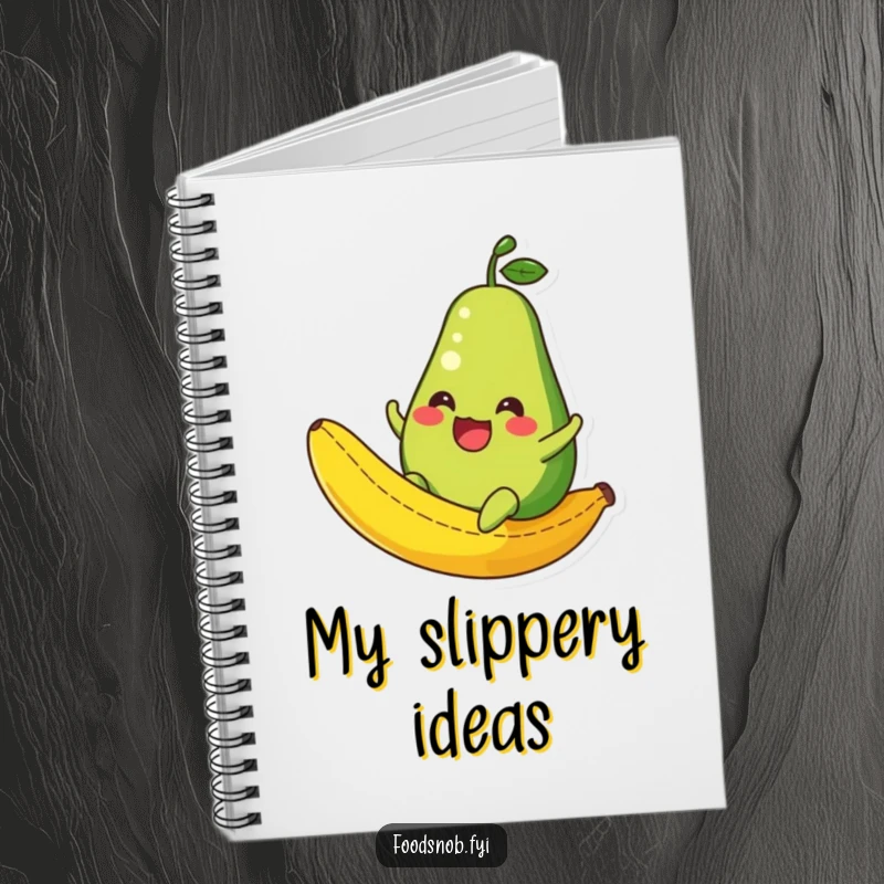 Funny Avocado Notebook: A fruit-themed notebook featuring a happy avocado character sliding down a banana peel, perfect for jotting ideas.